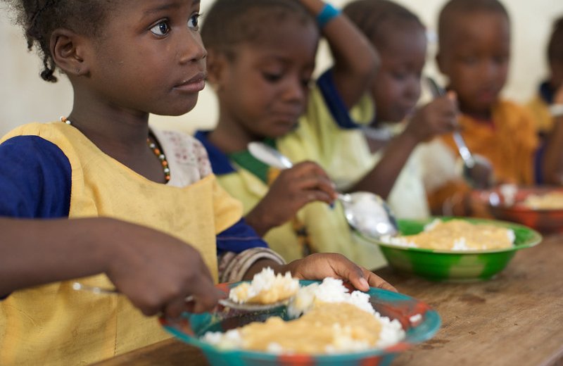 Children sharing a meal as part of a feeding support programme